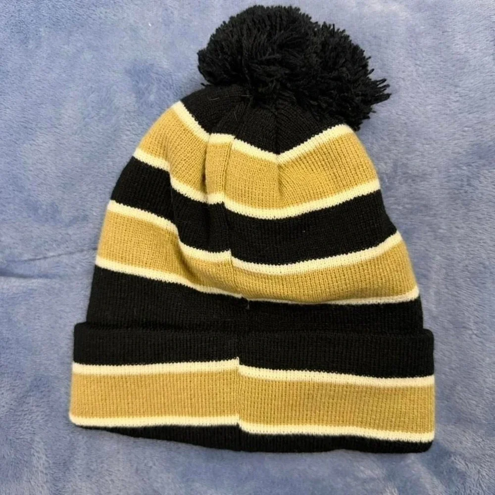 True Religion‎ black and gold striped beanie with pom pom